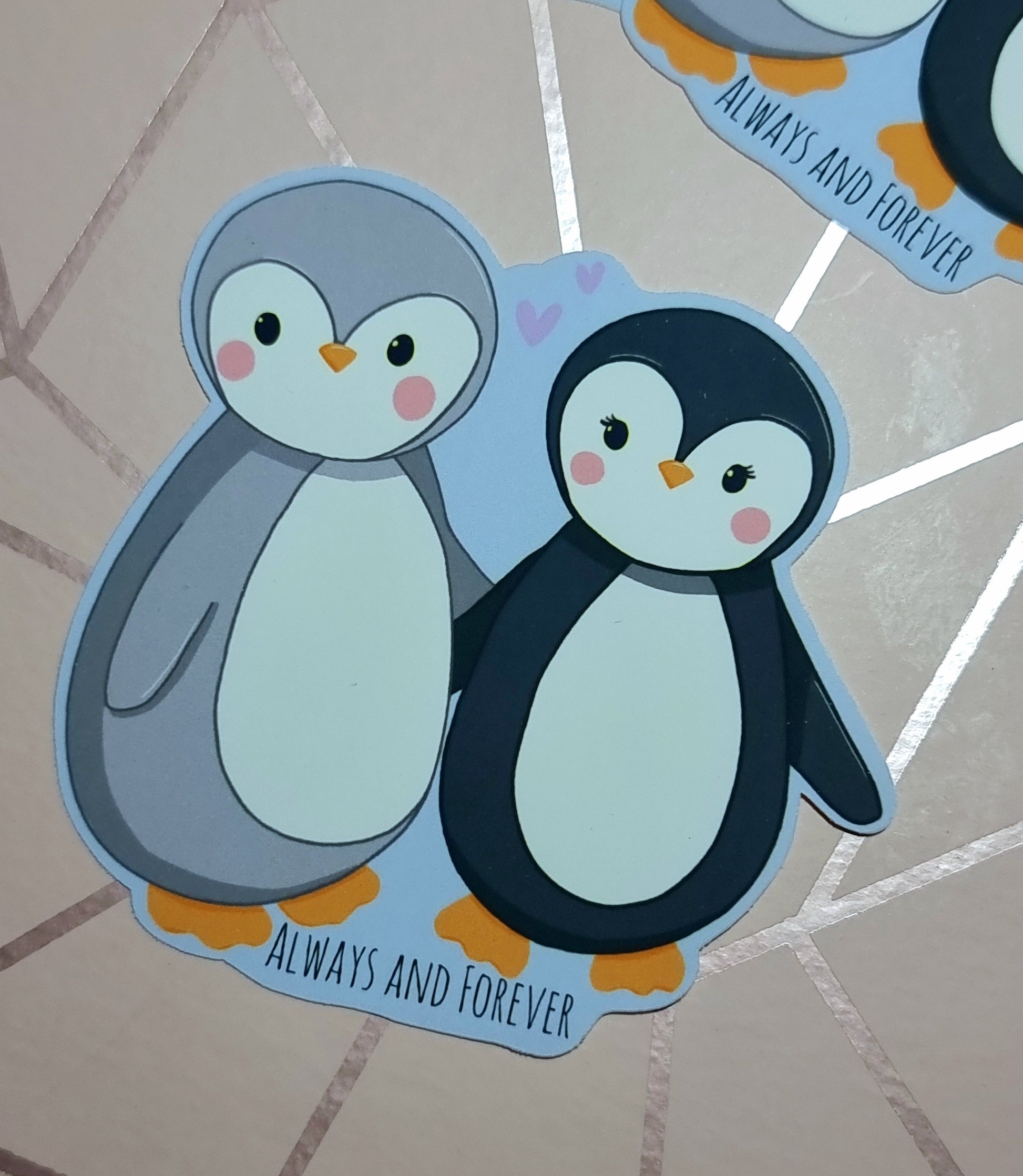 Cute penguin couple blue background with small quote at the bottom of Always and forever